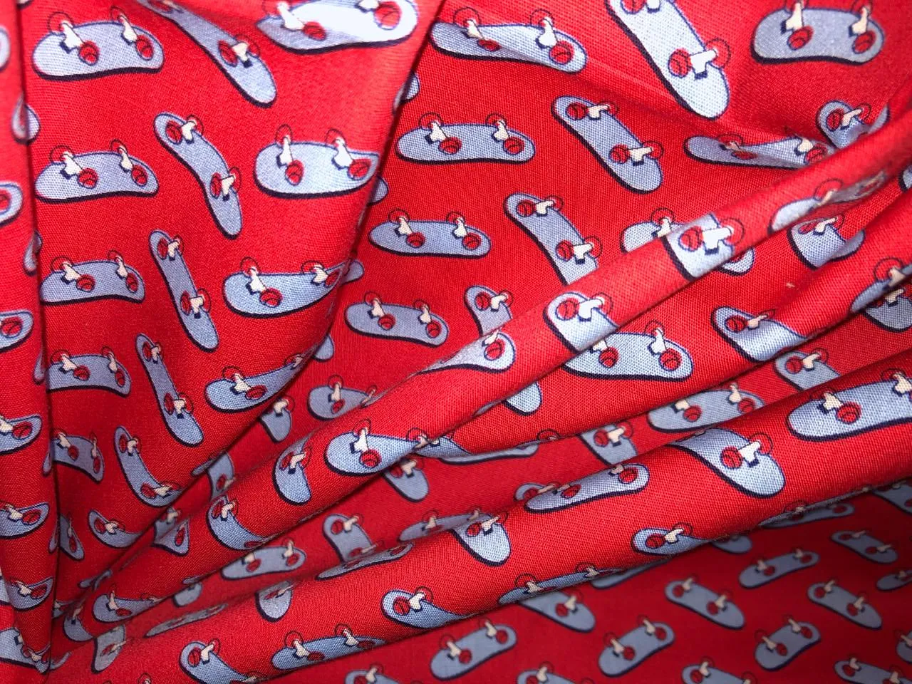 100% Cotton Poplin  Beach Prints 58" wide available in 4 prints red with blue skates/ bird bright orange flowers and the beach scene